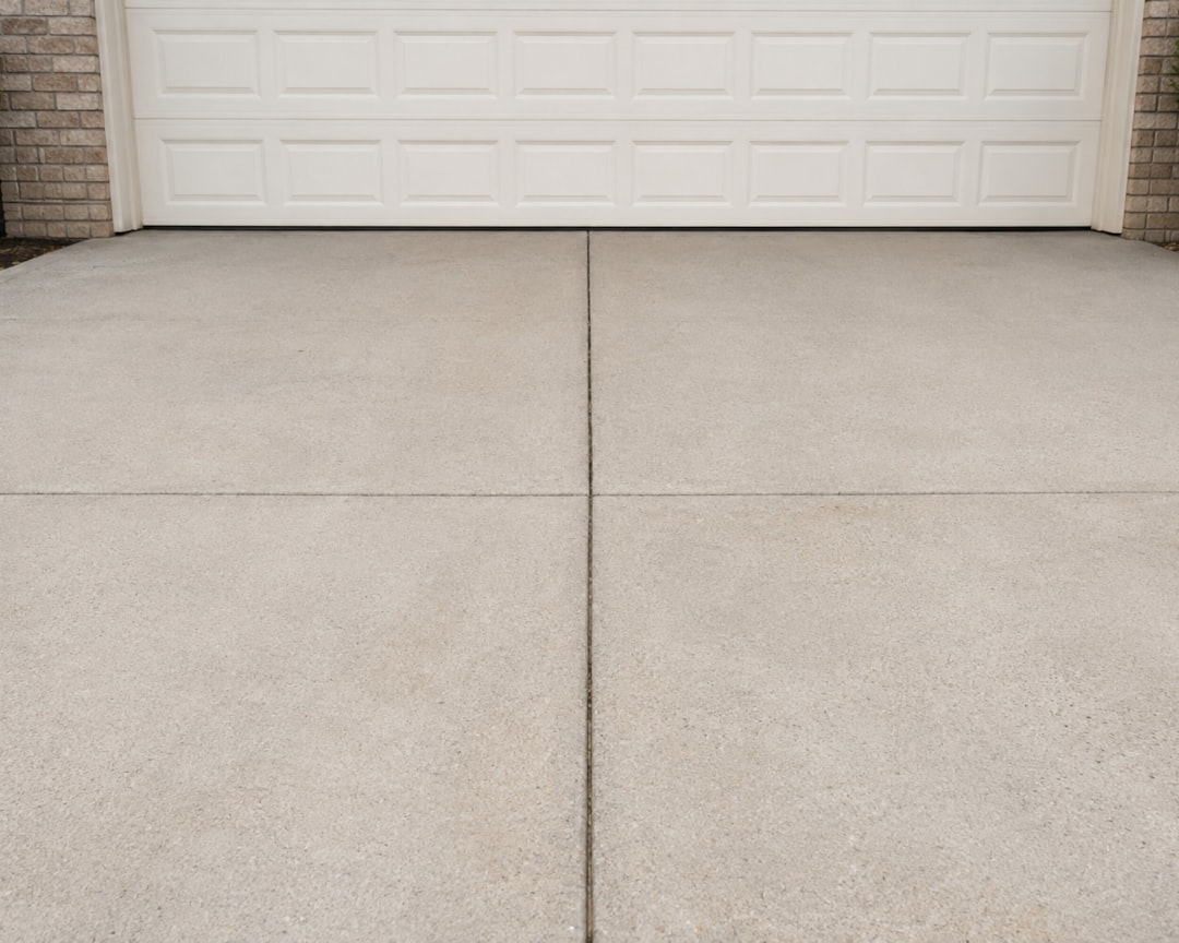 Freshly poured and finished concrete driveway at a Jackson, Tennessee home